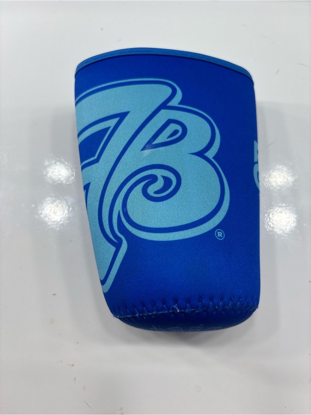Blue 7brew coffee sleeve
